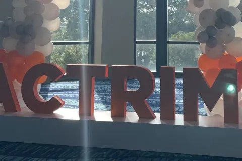 Signage in one of the meeting halls at ACTRIMS