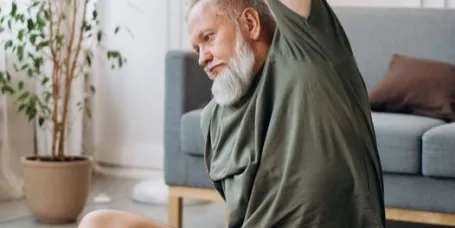 Person engaging in seated yoga