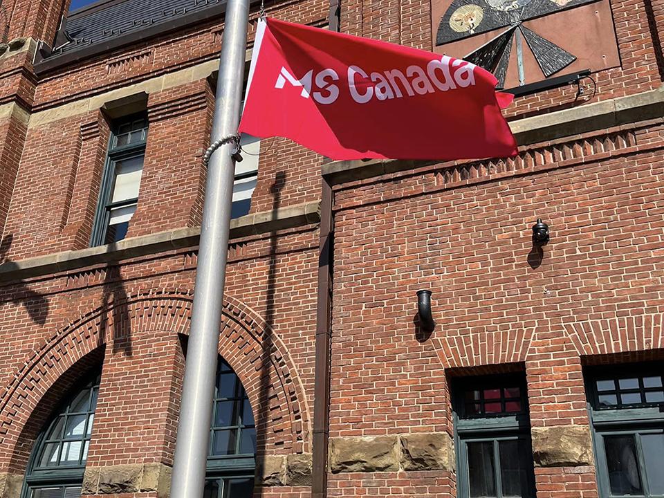An Ms Canada flag being raised.