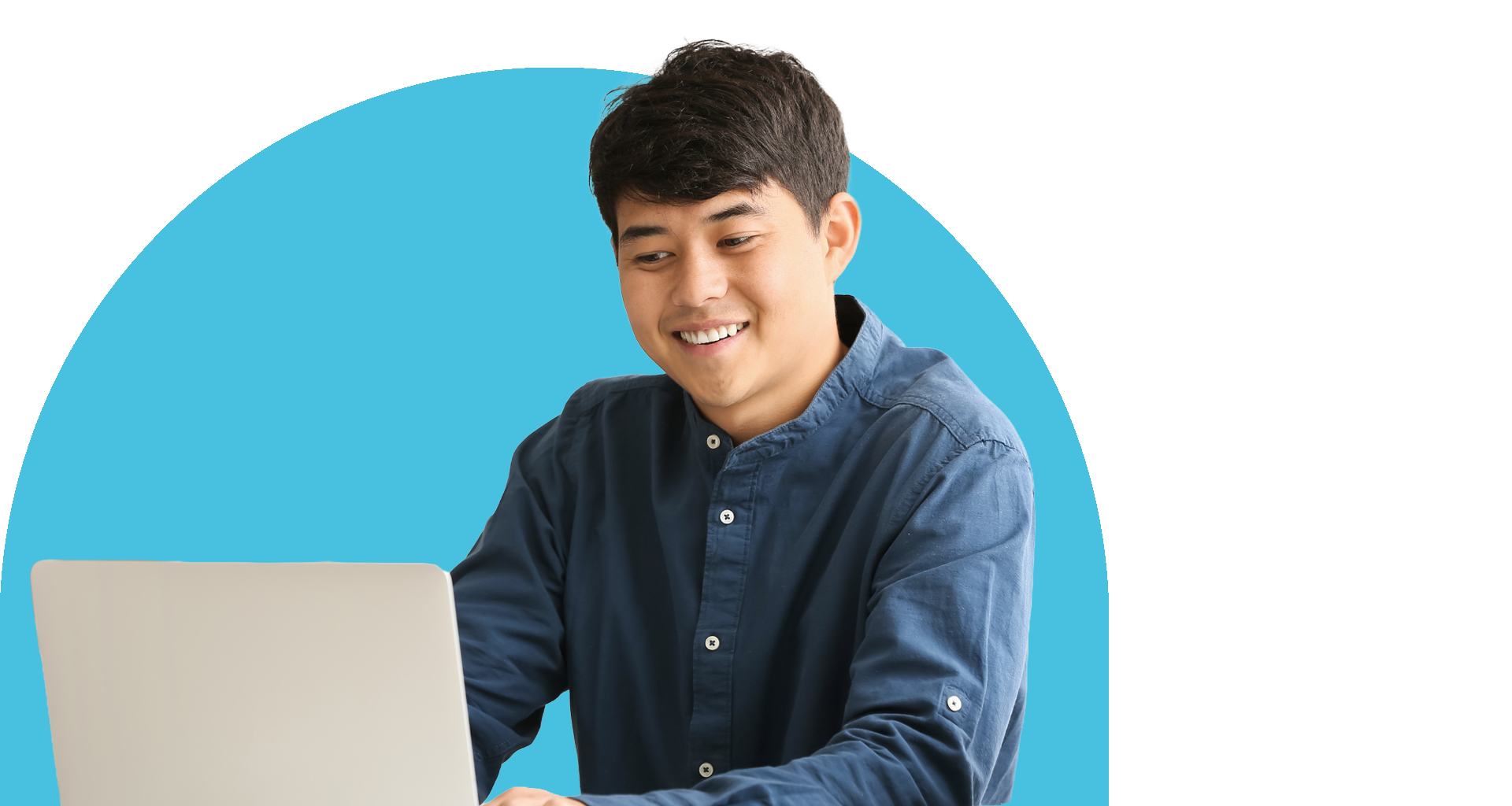 Young man smiling while working on a laptop, against a teal circular background.